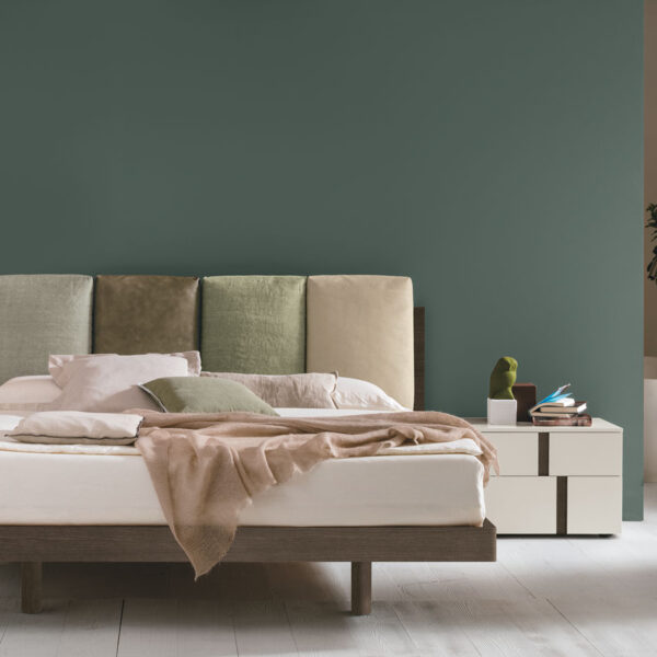 “Nikki bed by Tomasella – modern Italian bed with gently curved upholstered headboard and sleek minimalist frame”