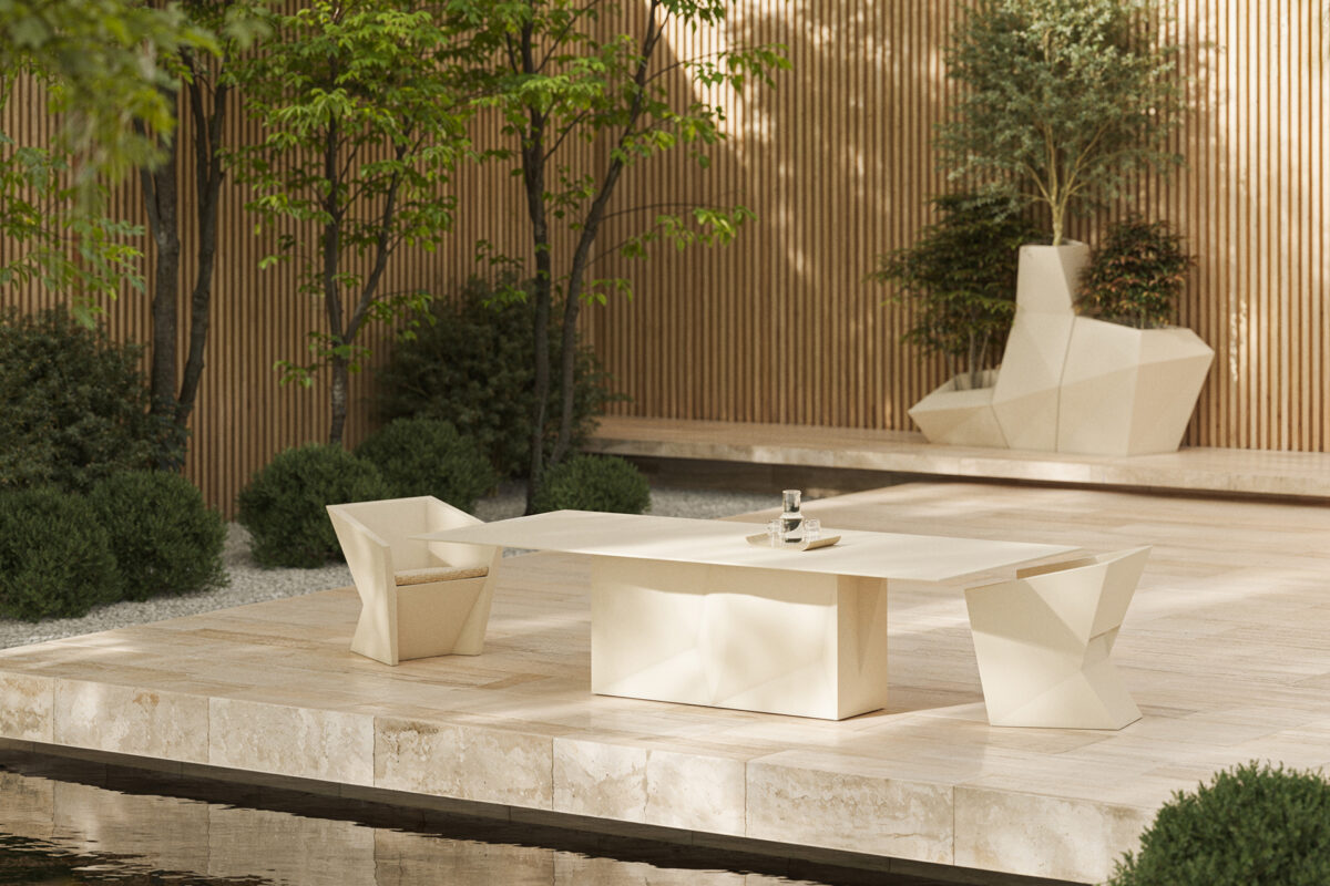 "FAZ Table by Vondom in sleek modern aluminum design on a patio setting"