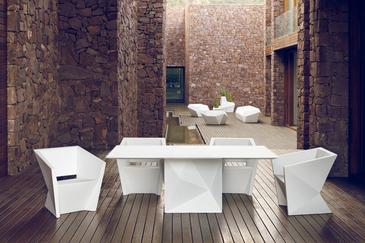 "Contemporary Italian FAZ Table by Vondom with minimalist style outdoors"