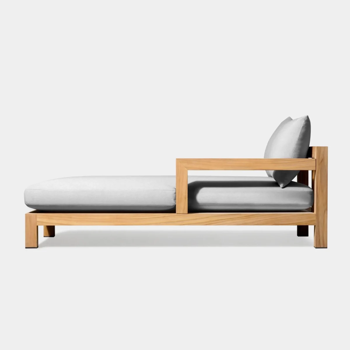 “Outdoor lounge scene with Pacific Teak Chaise by Harbour – minimalist and elegant teak furniture”