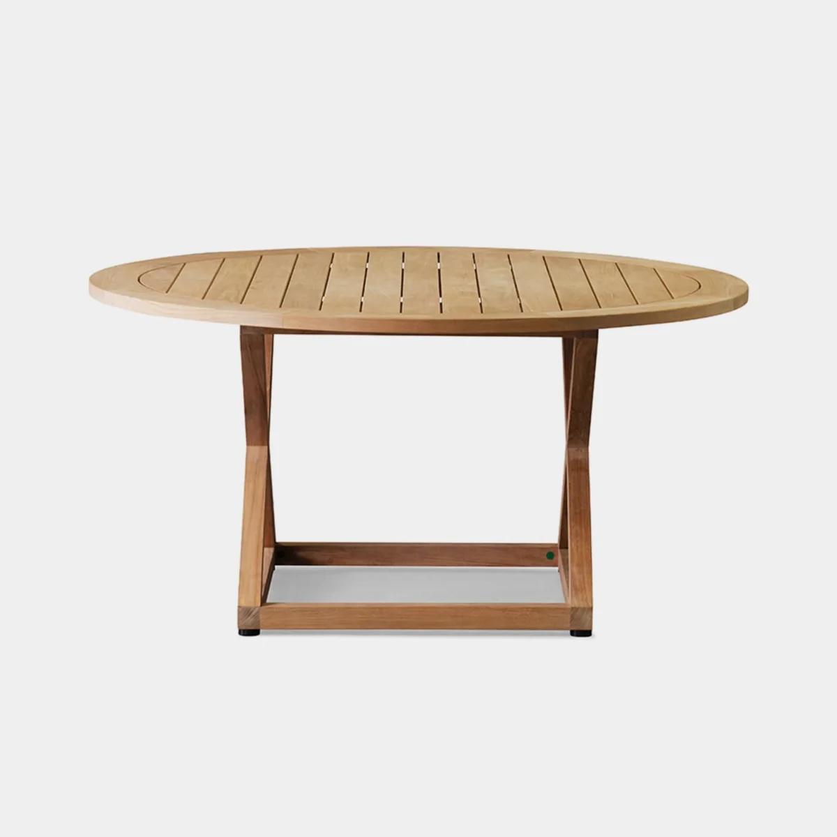 “Sunlit view of round Pacific teak table – timeless design for modern outdoor living”