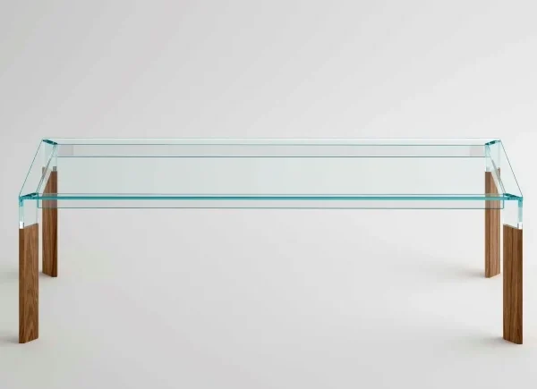 Perseo dining table by Tonelli Design with extra-clear glass top and solid Canaletto walnut legs, displayed in Royal Oak, Michigan.