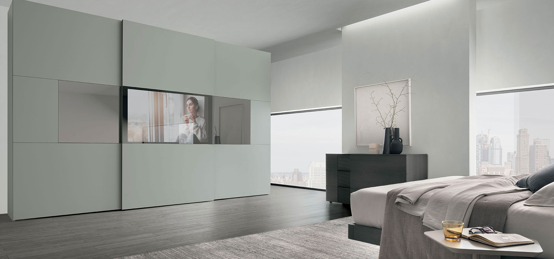 “Primafila Sliding wardrobe by Tomasella – modern Italian wardrobe with full-glass sliding doors and refined aluminum profiles”