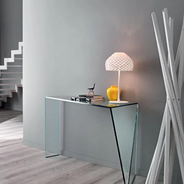 Penrose Console by Tonelli Design with transparent glass structure and asymmetric design, displayed in Royal Oak, Michigan.