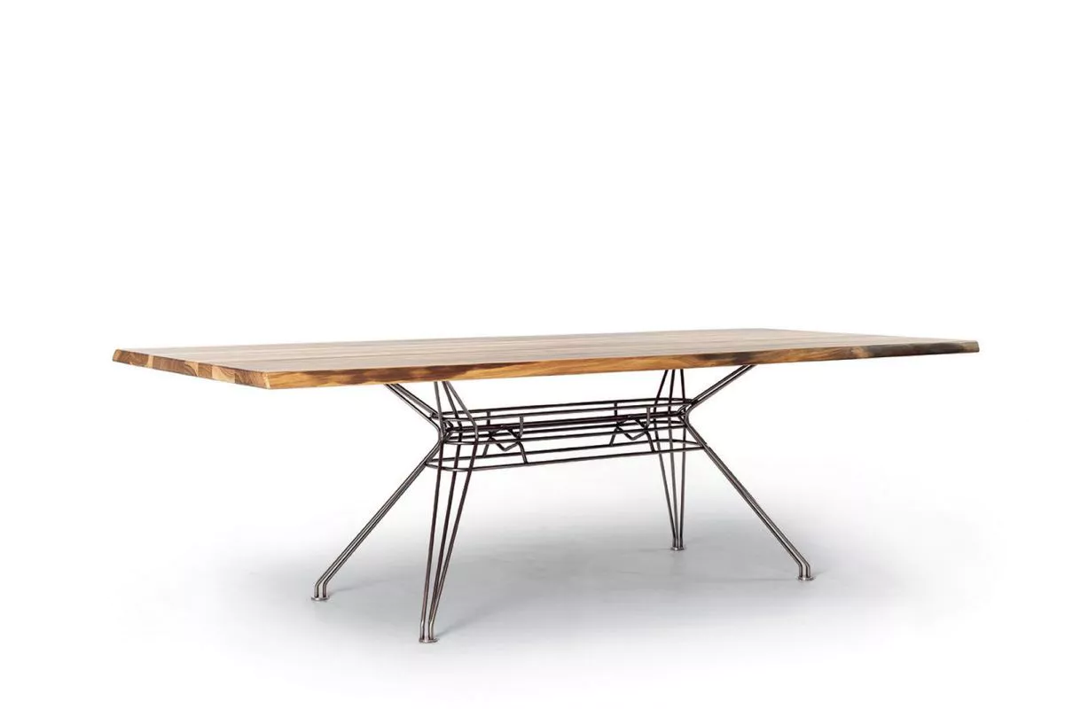 Close-up of Sander table's glossy anthracite lacquered glass surface with matching extension leaves.
