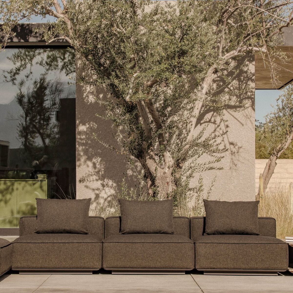 “Close-up of Santorini Outdoor Armless Single – clean lines, thick cushions, and powder-coated base”