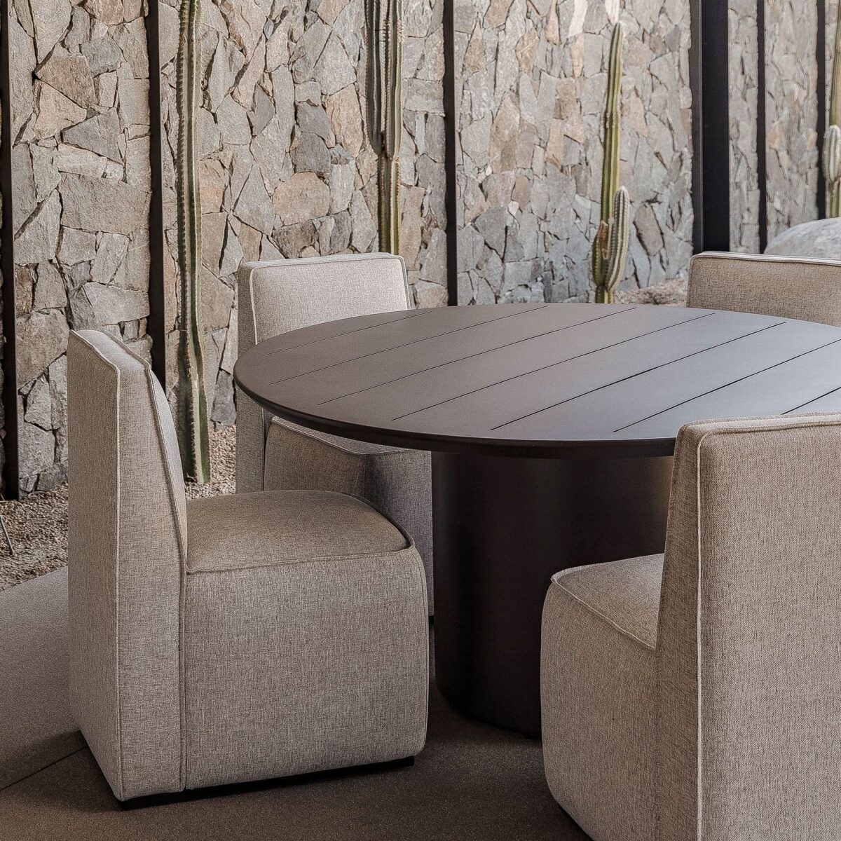 “Santorini round dining table by Harbour – durable aluminum frame with slatted surface for outdoor use”