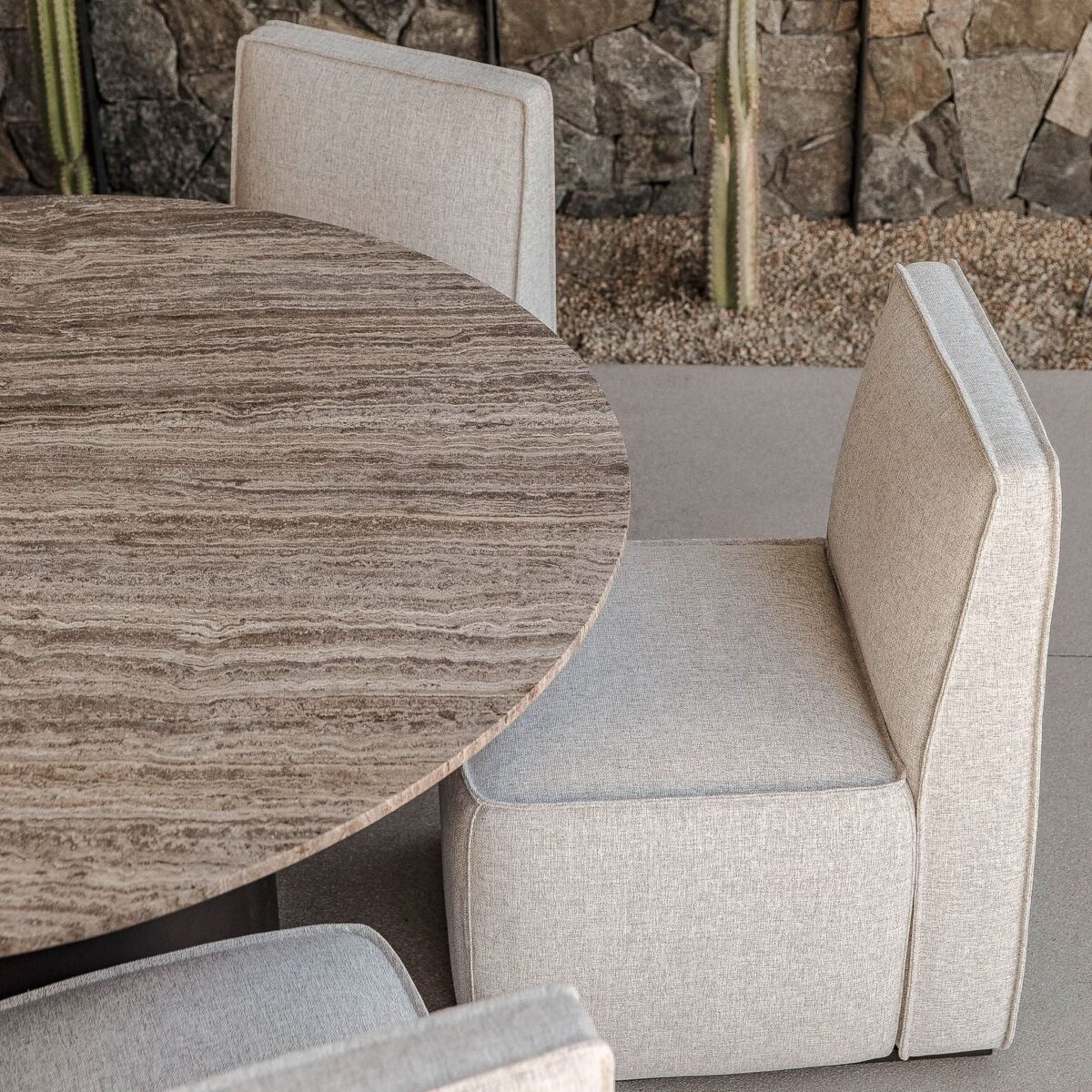 “Outdoor round stone dining table by Harbour – Santorini collection with clean lines and solid construction”