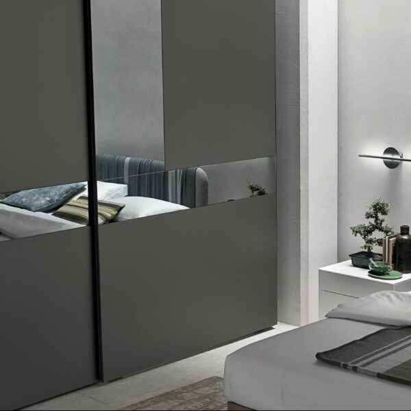 “Cristal Sliding wardrobe by Tomasella – modern Italian wardrobe with glass sliding doors and minimalist aluminum profiles”