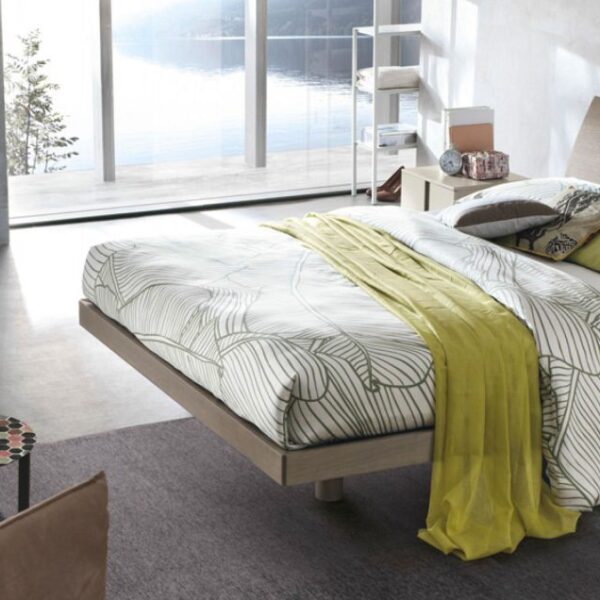 “Narciso single bed by Tomasella – modern Italian bed with elegant tufted headboard and minimalist frame”