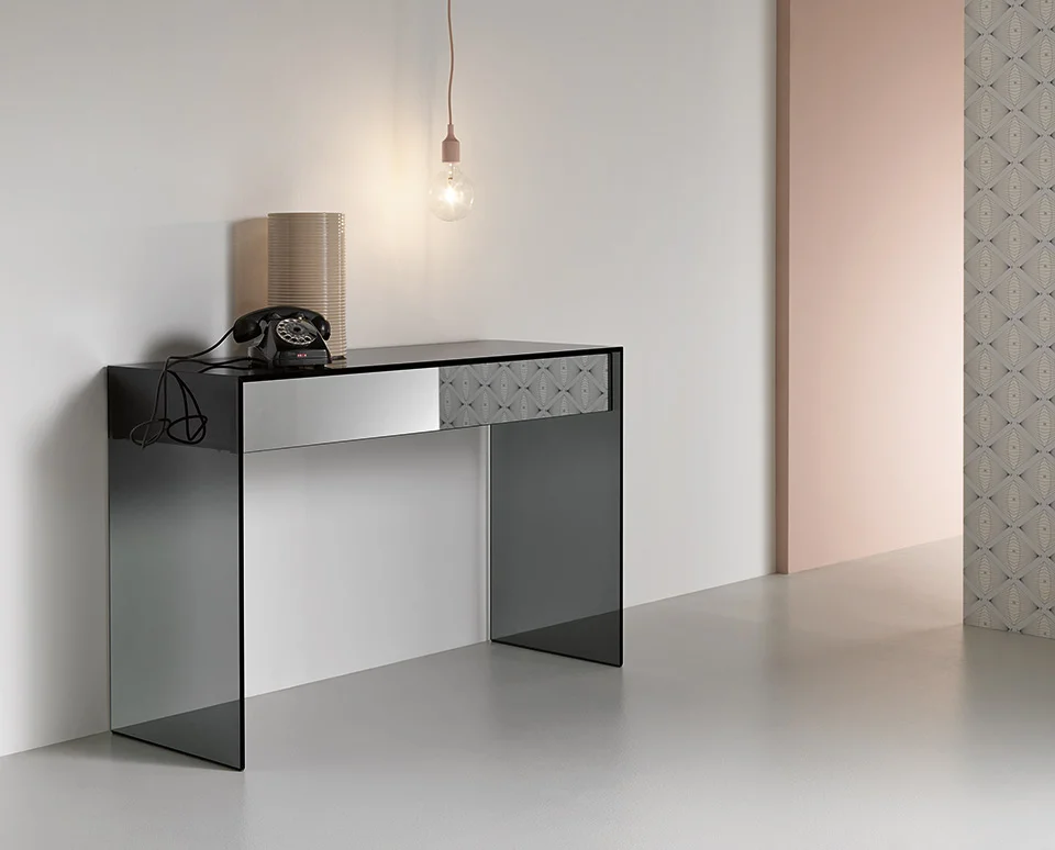 Gotham Console Table by Tonelli Design with smoked glass frame and black wooden drawer, displayed in Royal Oak, Michigan.