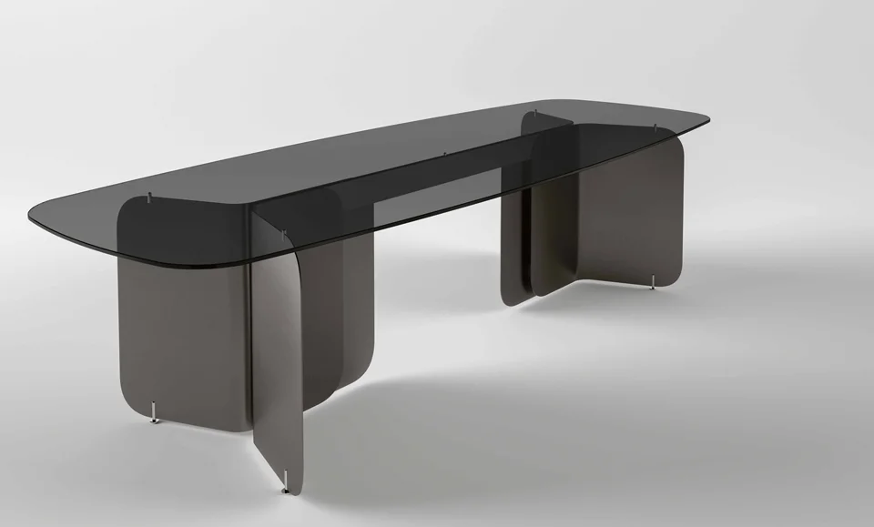 Pleat dining table by Tonelli Design with extra-clear glass top and metallic champagne metal base, displayed in Royal Oak, Michigan.