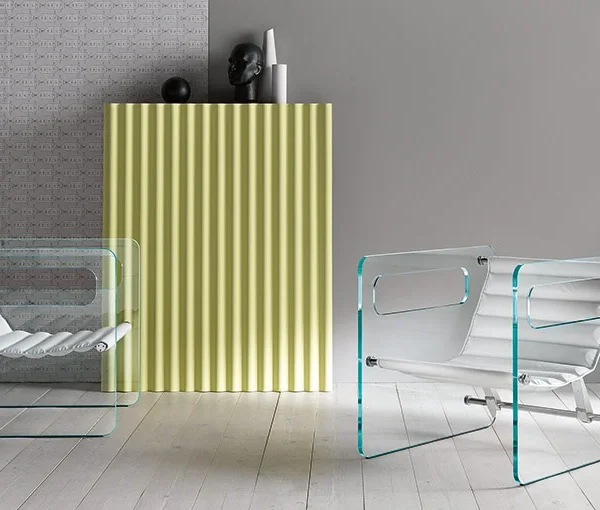 Modern Italian glass armchair Naked by Tonelli Design, featuring transparent or extra-clear glass panels with cutout armrests and a black leather seat, available in Royal Oak, Michigan.