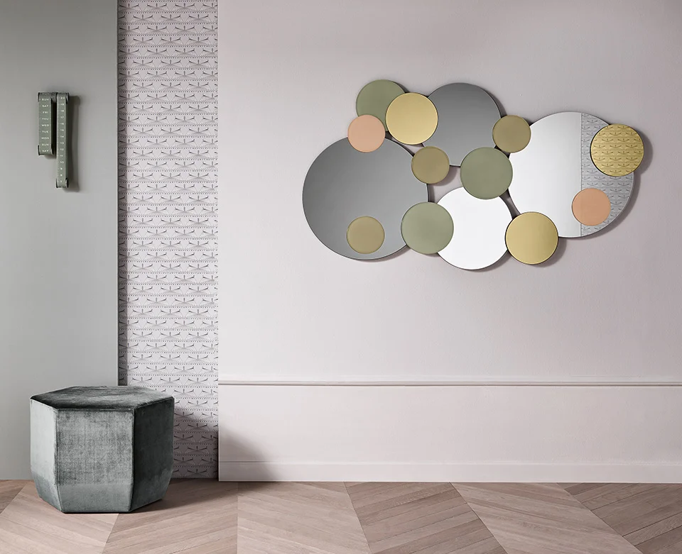 Tonelli Design's "Atomic" is a captivating glass mirror with a unique, multi-faceted design. Modern Italian art for luxurious Royal Oak homes.