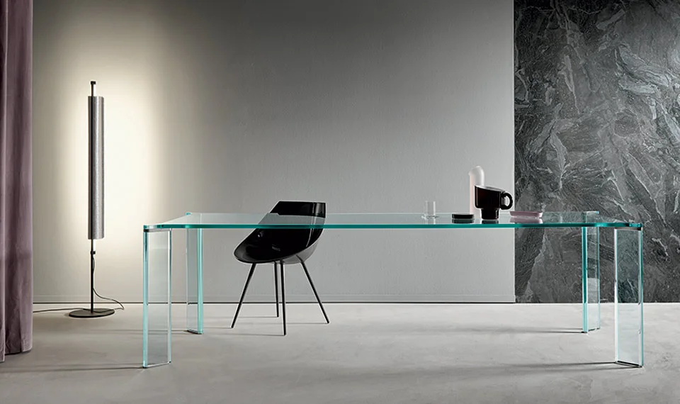Can Can dining table by Tonelli Design with layered glass top and Canaletto walnut legs, displayed in Royal Oak, Michigan.