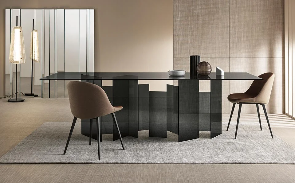 Metropolis dining table by Tonelli Design with Calacatta Gold marble-effect ceramic top and smoked glass base, displayed in Royal Oak, Michigan.