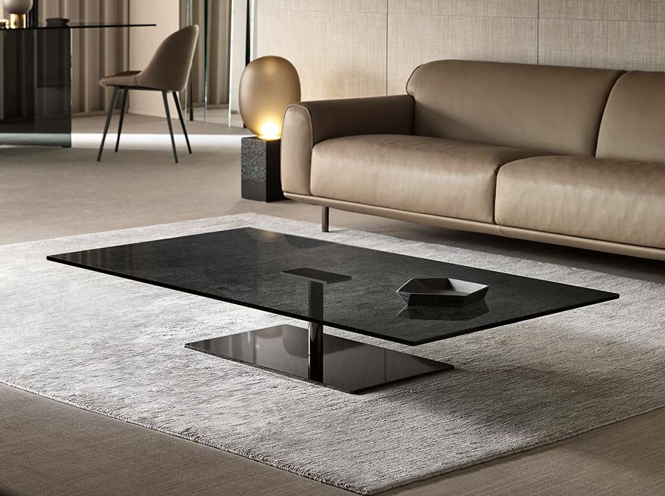 Farniente Low Table by Tonelli Design featuring a transparent glass top and chrome base, displayed in Royal Oak, Michigan.