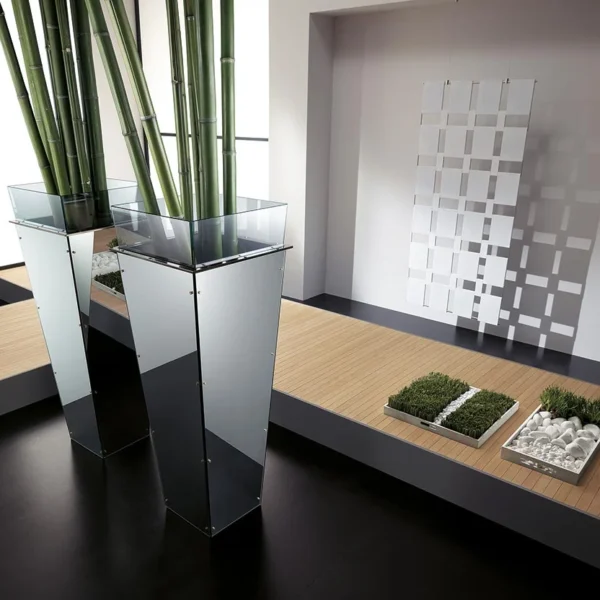 Modern Italian glass vase Amon by Tonelli Design, featuring a galvanized internal structure with interchangeable lacquered or mirrored glass panels, available in Royal Oak, Michigan.