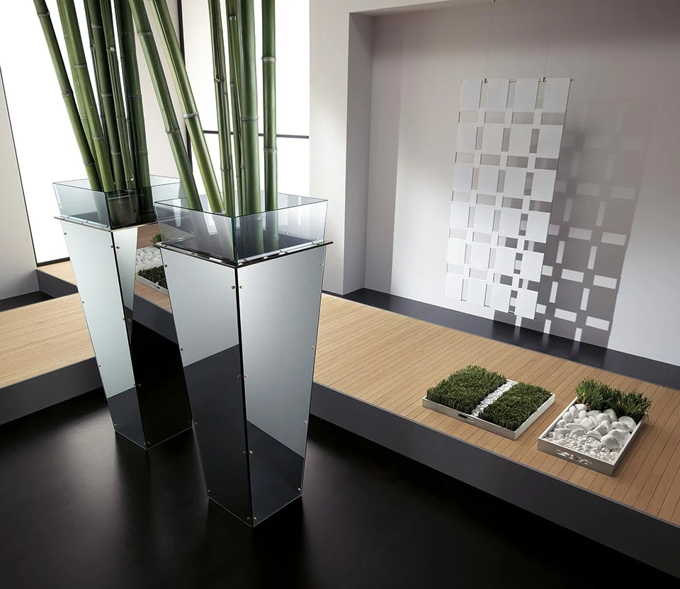 Modern Italian glass vase Amon by Tonelli Design, featuring a galvanized internal structure with interchangeable lacquered or mirrored glass panels, available in Royal Oak, Michigan.