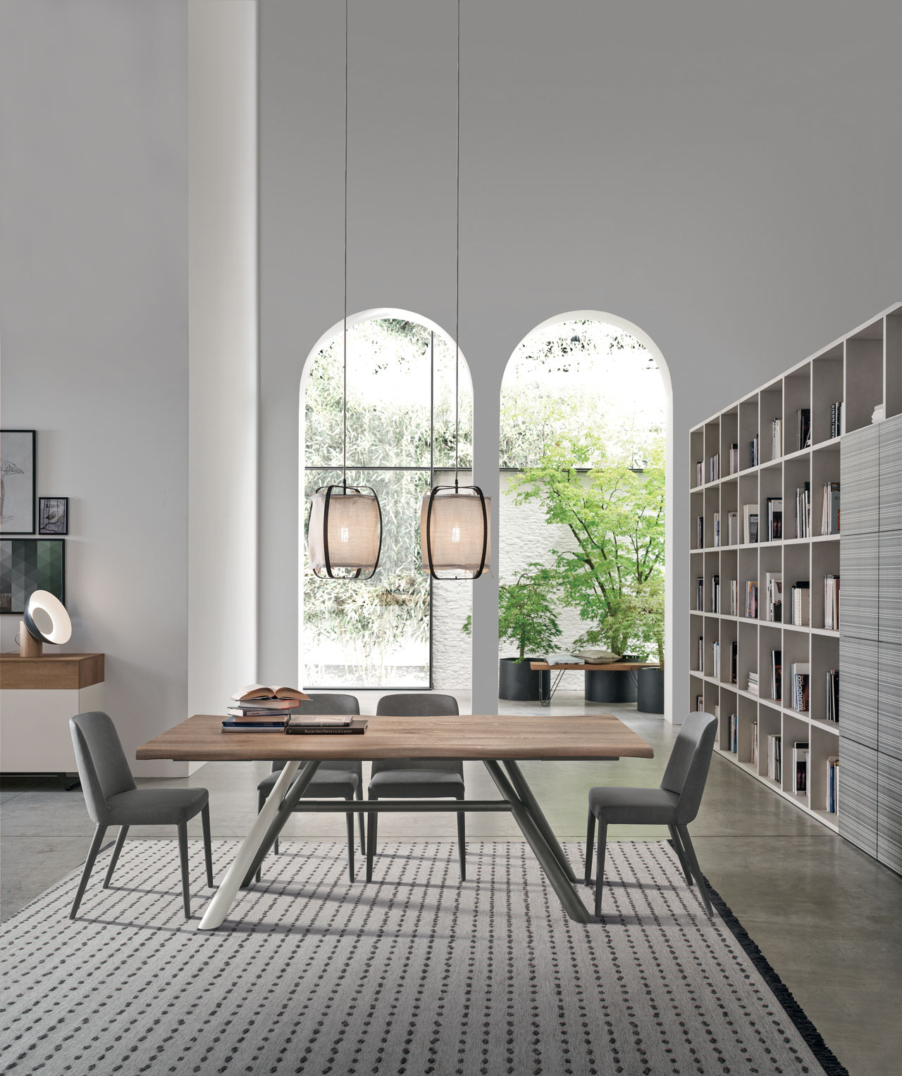 “Tudor table by Tomasella – modern Italian dining table with solid wood top and elegant metal legs”