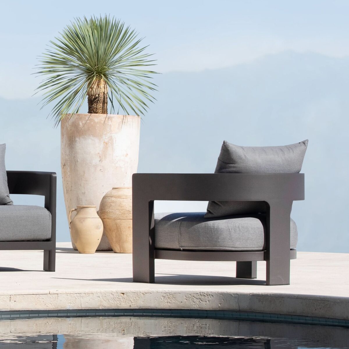 “Harbour Victoria Lounge Chair – modern outdoor aluminum chair with cushioned comfort and sleek form”