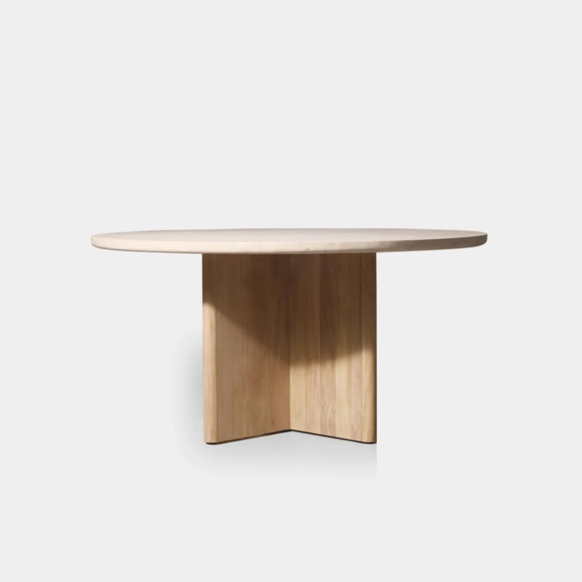 “Side angle showing Victoria teak table – thick tabletop with robust slatted pedestal base”