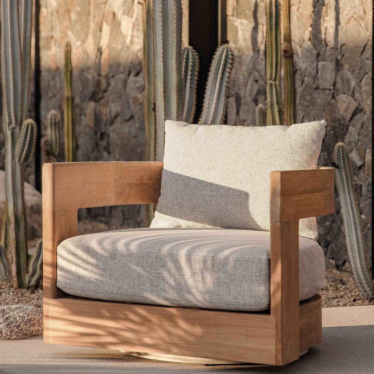 “Victoria Swivel Lounge Chair by Harbour – stylish teak patio chair with clean lines and functional motion”