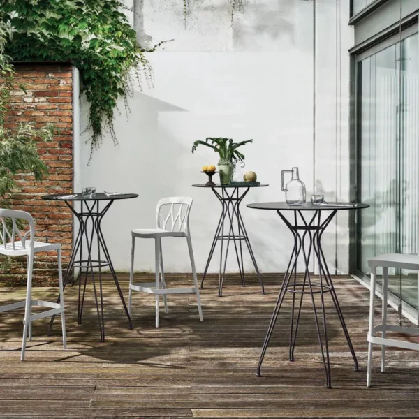 “Vincent High Outdoor chair by Bontempi – elegant high‑back outdoor seat with weather-resistant wicker and slender powder-coated aluminum legs.”