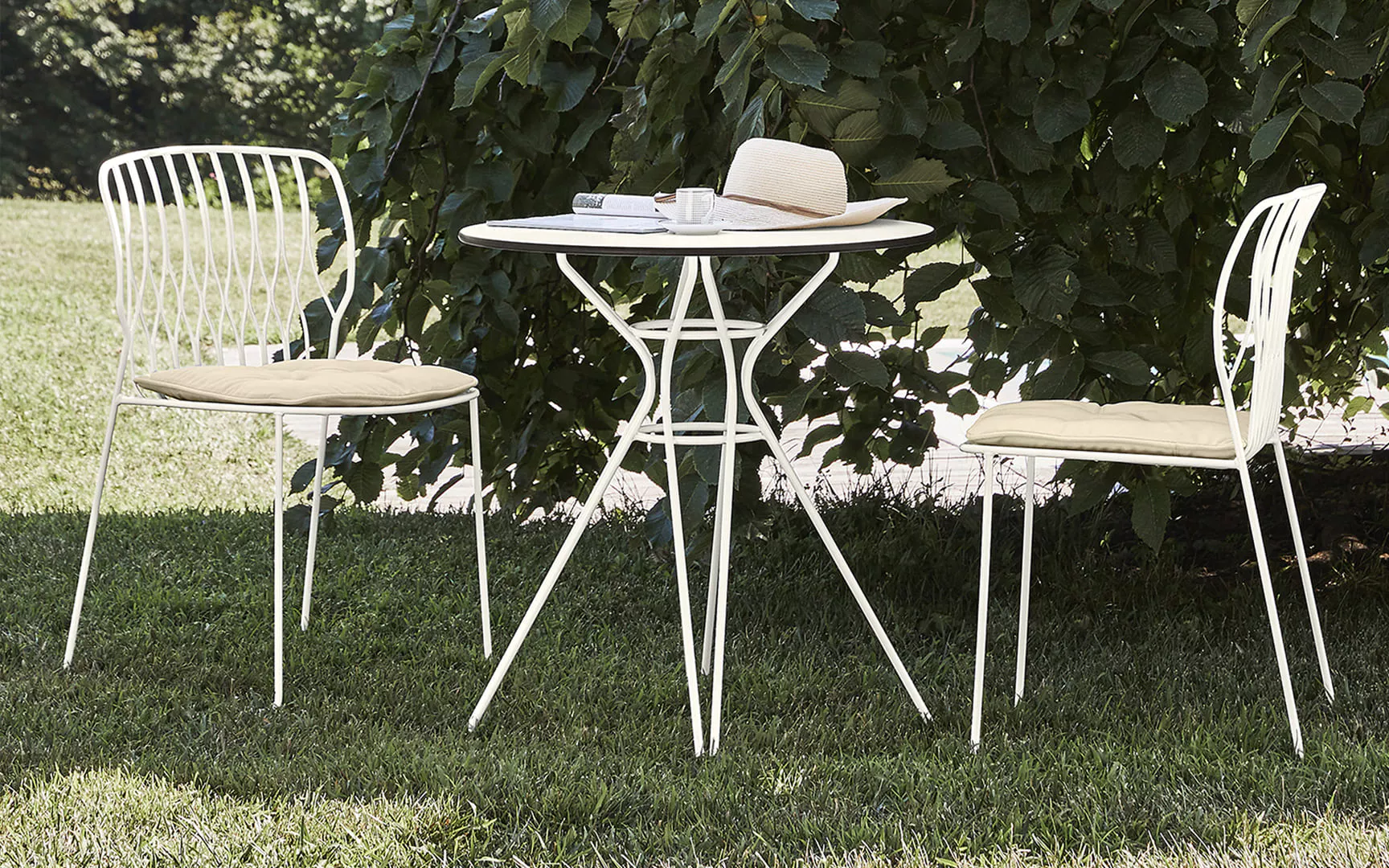 “Vincent Low Outdoor chair by Bontempi – modern low‑back outdoor seat with weather-resistant wicker and slim aluminum legs.”