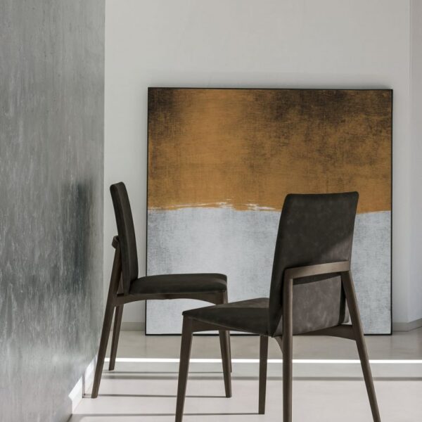 “York chair by Tomasella – modern Italian dining chair with upholstered seat and gently curved backrest for elegant comfort”