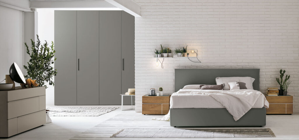 “Zeno bed by Tomasella – modern Italian bed with low-profile design and vertical panel upholstered headboard”