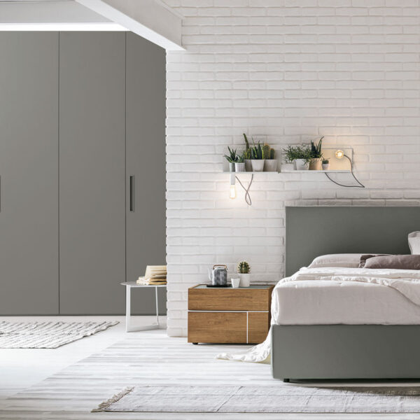 “Zeno bed by Tomasella – modern Italian bed with low-profile design and vertical panel upholstered headboard”